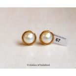 Pair of mabé pearl ear studs, mounted in yellow metal stamped as 14ct