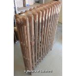 A cast iron radiator 940 x 73cm.