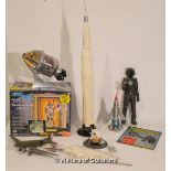 A collection of pre-made scale models and toys: the Apollo Spacecraft, Apollo Saturn V Rocket,