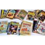 A mixed collection of comics, magazines, books and annuals including Rupert the Bear, Tintin,