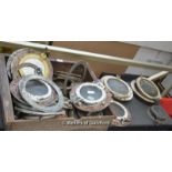 Twelve portholes in various sizes; parts of portholes, quantity.