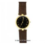 *Ladies' Must de Cartier silver gilt wristwatch, circular black dial with Roman numerals, case