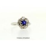 Sapphire and diamond cluster ring, central round cut sapphire with a surround of old cut diamonds,