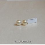 Button pearl ear studs with yellow metal screw posts, stamped 9ct