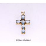 Aquamarine cross, oval cut aquamarines mounted in yellow metal stamped as 9ct, 30 x 12mm