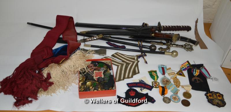 A quantity of military badges, buttons, swagger sticks, banners, etc; Masonic jewels.