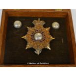 Royal Marines, late Victorian badge and globe buttons, in glazed frame.