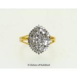 Diamond cluster ring, round brilliant cut and baguette cut diamonds set in a marquise shape,