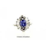 Sapphire and diamond ring, central oval cut sapphire with a surround of baguette cut and round