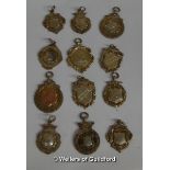 Twelve silver watch fobs, some with gold, gross weight 111.7 grams