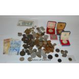 A collection of assorted coins inlcuding 20th Century crowns.