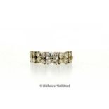 Diamond half eternity ring, twenty round brilliant cut diamonds in floral clusters, estimated
