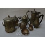 An Indian white metal three piece tea service comprising globular teapot, sugar bowl and milk jug;