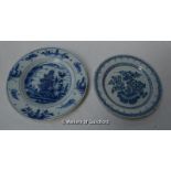 Two delftware plates, one decorated with flowers in a pot, 20cm diameter; the other with a landscape