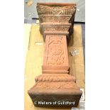 *A red sandstone garden plinth with stylised floral carving, 91cm high. Weighs approx 135kg