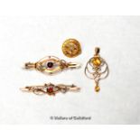 Two bar brooches, both set with garnets, an Art Nouveau style pendant set with an oval cut and