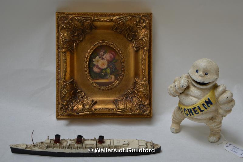 A Triang model of HMS Queen Mary; cast iron Michelin Man model; modern oil on board, still life with