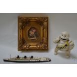 A Triang model of HMS Queen Mary; cast iron Michelin Man model; modern oil on board, still life with