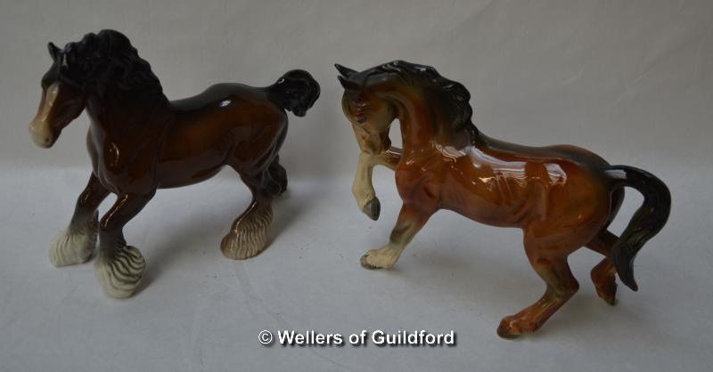 A Beswick cantering Shire horse; a ceramic horse stamped Holland.