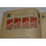 A small stamp album of world stamps including Chinese reprints.