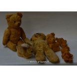Five vintage teddy bears including a jointed straw stuffed example with stitched nose, mouth and