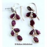 Georgian garnet drop earrings, oval and pear shaped garnets mounted in a yellow metal closed back