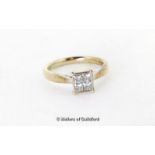 Princess cut diamond ring, four princess cut diamonds in a square shaped rubover setting,