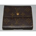 A Louis Vuitton lady's purse/wallet.