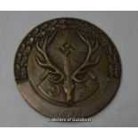 *A German Hunting Society bronze plaque dated 1935, initialled D.J. for Deutsche Jagerschaft. (Lot