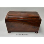 *A Regency rosewood sarcophagus shaped tea caddy with ebony line inlay, the lid opening to reveal