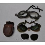 A pair of vintage Melton patent flying goggles; a pair of folding flying goggles with tinted lenses,