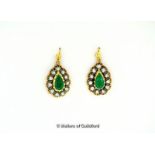 Emerald and diamond cluster drop earrings, each earring set with a pear shaped emerald with a