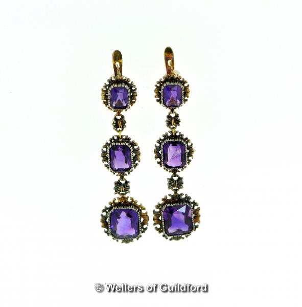 Amethyst drop earrings, each earring set with three rectangular cut amethysts, mounted in an