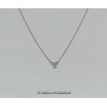 Tiffany & Co diamond set pendant, three round brilliant cut diamonds mounted in platinum,