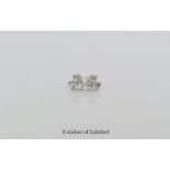 Tiffany & Co diamond set earrings, each earring set with three round brilliant cut diamonds, mounted