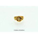 Three stone diamond ring, a knot design set with three old cut diamonds in 18ct yellow gold, ring