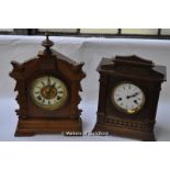 A German H.A.C. oak cased mantel clock with 14 day movement striking on a gong; an Ansonia walnut