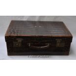 *A vintage crocodile skin travelling dressing case or suitcase, monogrammed S.G., with watered