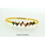 Multi-gem set bangle, marquise shaped emeralds, sapphires, rubies and diamonds mounted in yellow