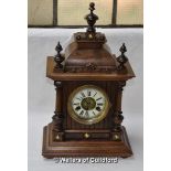 *An H.A.C. 14 day strike wooden mantel clock, the white dial with Roman numerals and two train