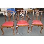 A set of seven walnut Chippendale style chairs with pierced back splat, drop in seats, acanthus knee