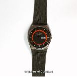 *Gentlemen's Skagen wristwatch, circular grey and orange dial, with Arabic numerals and baton hour