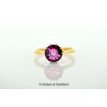 Pink tourmaline ring, round cut pink tourmaline claw set in 18ct white gold, on an 18ct yellow