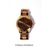 *Michael Kors wristwatch, circular grey dial with baton hour markers, in rose coloured stainless