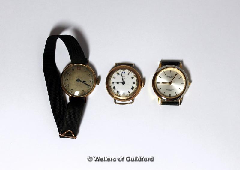 Ladies' 9ct yellow gold backed wristwatch with black fabric strap, together with a 9ct gold backed