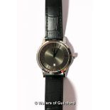 *Gentlemen's Gc wristwatch, circular grey dial, with Roman numerals and baton hour markers, date