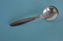 A good Georg Jensen preserve spoon with textured h