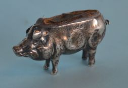 A small pin cushion in the form of a pig. Birmingh