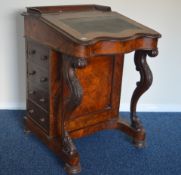 A walnut Davenport with hinged top and dummy drawe