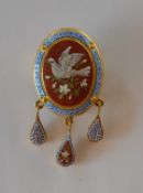 A fine quality micro mosaic pendant/brooch mounted